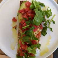Vegan mozzarella, avocado, tomato toast at ONO in Rhodes