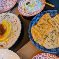 Pitta bread, fava with caramelised onion, tzatziki at ONO in Rhodes