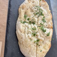 Feta and garlic flatbread - I can’t stop thinking about it  at ONO by Marouli in Rhodes