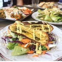 Pie with vegetables and salad, Indian lentil stew, amazing raw zucchini salad at ONO in Rhodes