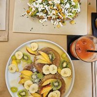 Pancakes with fruits & scrambled chickpea toast at ONO in Rhodes