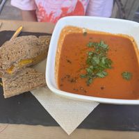 Tomato soup with vegan cheese sandwich.  at ONO by Marouli in Rhodes