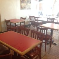 inside seating - bench seats in the window at Rovente Pizzeria - Downtown in Portland