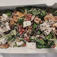 Salad with cashew feta, dried figs, mushrooms, tomatoes, pomegranate seeds, poppy seeds.  at Veganaki in Athens
