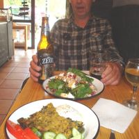 Plastos  spinach bake (front) and gourmet salad (rear) at Veganaki in Athens