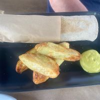 Meatballs in tomato sauce in a wrap, little spicy, and delicious American style mayonnaise   at Veganaki in Athens