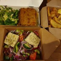 Pastitsio €11.00, Airfried potatoes €5.80, Greek salad €8.50 at Veganaki in Athens