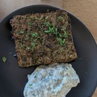 Zucchini pie with tzatziki sauce at Veganaki in Athens