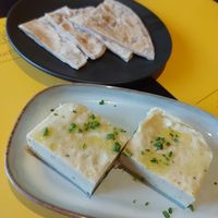 Feta cheese (from cashew milk), pita bread at Veganaki in Athens