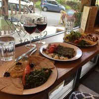 Hummus & tabbouleh, spinach pie, falafel plate at Veganaki in Athens