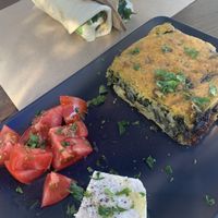 Spinach pie and falafel wrap at Veganaki in Athens