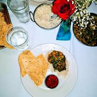 Vegan Dal with Spinach & Poppadums with onion chutney. at Guru Restaurant in Clermont