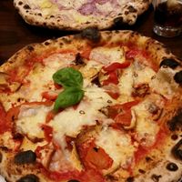 Stella Nera and vegan cheese in front, patata e cipolle in back at La Stella Nera in Berlin