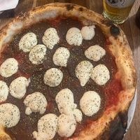 Diavola (tomato sauce, housemade spicy seitan sausage, housemade vegan cheese, oregano) at La Stella Nera in Berlin