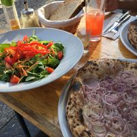 Insalata Mista, pizza, drinks (limoncello and aperol drink - super good!) at La Stella Nera in Berlin