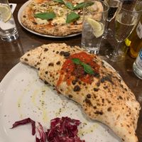 Pizza and calzone  at La Stella Nera in Berlin