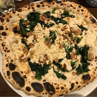 Pizza Spinaci Bianca. A bit more flavor would’ve been nice. Maybe some herbs and seasoning. at La Stella Nera in Berlin