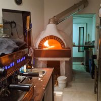 Oven and espresso maker at La Stella Nera at La Stella Nera in Berlin