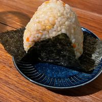 I forget what these little triangular rice cakes are called. It was OK, but not as flavorful as the other items. at Obon Shokudo in Portland
