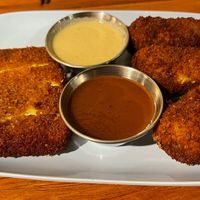 Two orders in this picture: the Katsu tofu steak, and the large tater tots. Both were really delicious. at Obon Shokudo in Portland