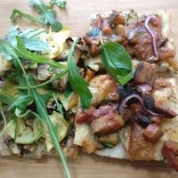 Vegan ratatouille, with eggplant and zucchini, and a vegan slice with artichoke and greens.  at Pizz'arome in Strasbourg