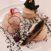 Hummus and buckwheat blinis at Mater Terrae in Rome
