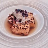 Tofu in a quinoa crust, stewed plums, spicy thai soup at Sense Eat in Paris