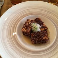 Quinoa-crusted tofu. Bland, despite the citrus sauce, and very small portion for 18 euros. at Sense Eat in Paris