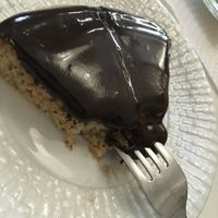 Fluffy banana cake with chocolate on top at Veganeats Caffe in Lisbon