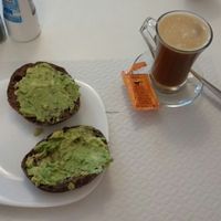Coffee with coconut&rice milk and Avocado and lime on carrob bread. at Veganeats Caffe in Lisbon