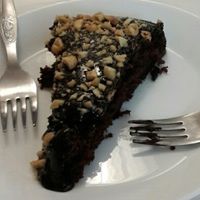 chocolate cake and rice pudding  at Veganeats Caffe in Lisbon