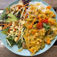 Daily dish- Curry with rice and salad at Veganeats Caffe in Lisbon