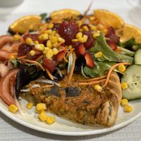 Quiche with salad at Veganeats Caffe in Lisbon