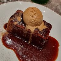 Sticky toffee pudding with caramel ice cream at Farmacy in West London