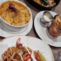 Pumpkin and turmeric curry with red rice and sprouted greens in a coconut broth + Truffle Mac&Cheese + Pad Thai rice noodles with roasted tofu & rainbow vegetables at Farmacy in West London