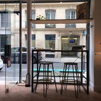 Seating for those having a bite to eat at 1944 Gallery Vegan Shop in Paris