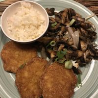 Delicious vegan potato pancakes with mushrooms and onions (sauerkraut on the side). So. Good. at Kartoffelhaus in Eisenach