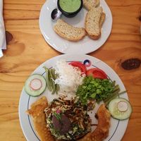A dish called Super berenjena which seems to be their signature dish. It includes vegetable tempura, a tower of sauted vegetables with bean "sauce "  at La Berenjena in Vinales
