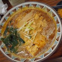 Spicy soy milk ramen (rich broth) with kimchi on the side at Qiu Dou Ru La Mien - Hagi Soymilk Ramen in Kaohsiung