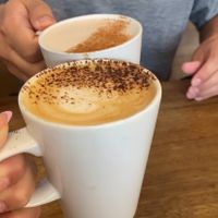 Oat milk cappuccino and chai latte   at Cafe Kino in Bristol