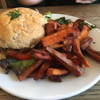 Burger with Sweet Potato Fries and Salad  at Cafe Kino in Bristol