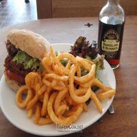 Burger and curly fries, with dandelion and burdock root drink. at Cafe Kino in Bristol