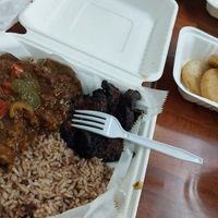 Jerk seitan with plaintains and rice and peas. We also got an extra side order of bammy or cassava cakes (on the right). at Jamaicaway in Nashville