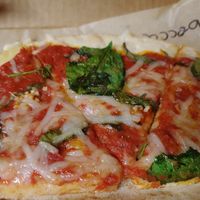 Spinach, basil, garlic, vegan cheese, vegan garlic butter drizzle at Dells Pizza Lab in Wisconsin Dells