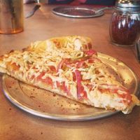 Vegan pizza with red onions and jalapeños at Homeslyce Pizza Bar in Columbia