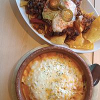 Patatas gauchas y totopos at La Huella Vegana in Rivas-vaciamadrid