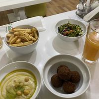 Mixed plate with falafel, salad, bread and hummus  at Falafel in Sarajevo
