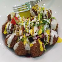 Falafel salad with tahini on top. Mmmmm yummy at Falafel in Sarajevo