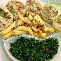 Falafel wrap with chips and tabouleh at Falafel in Sarajevo