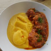 Marinated Beyond Meat meatballs with pureèd parsnips. at Vyro Raw & Vegan Bistro in Bucharest